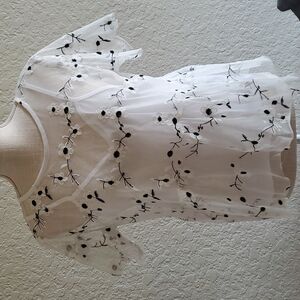 Sheer floral peplum top